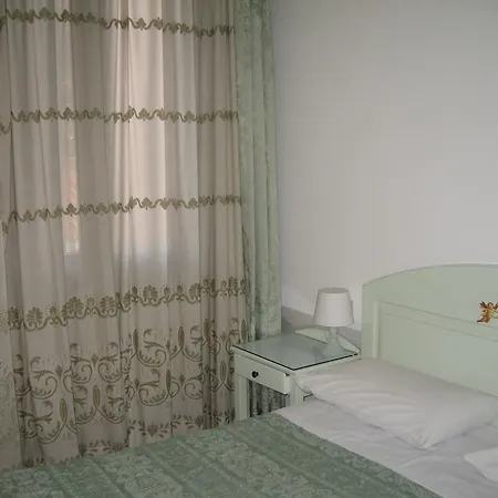 Adua Отель