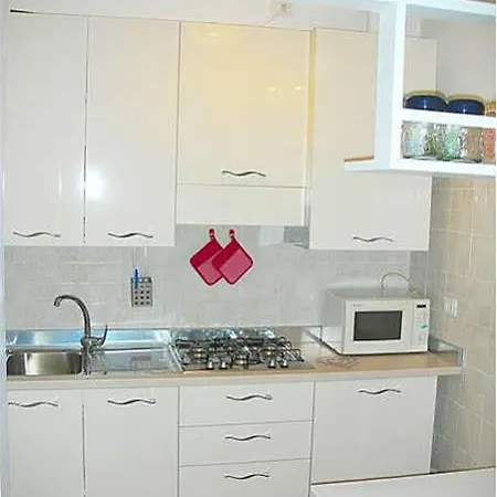 Queen House Apartamento